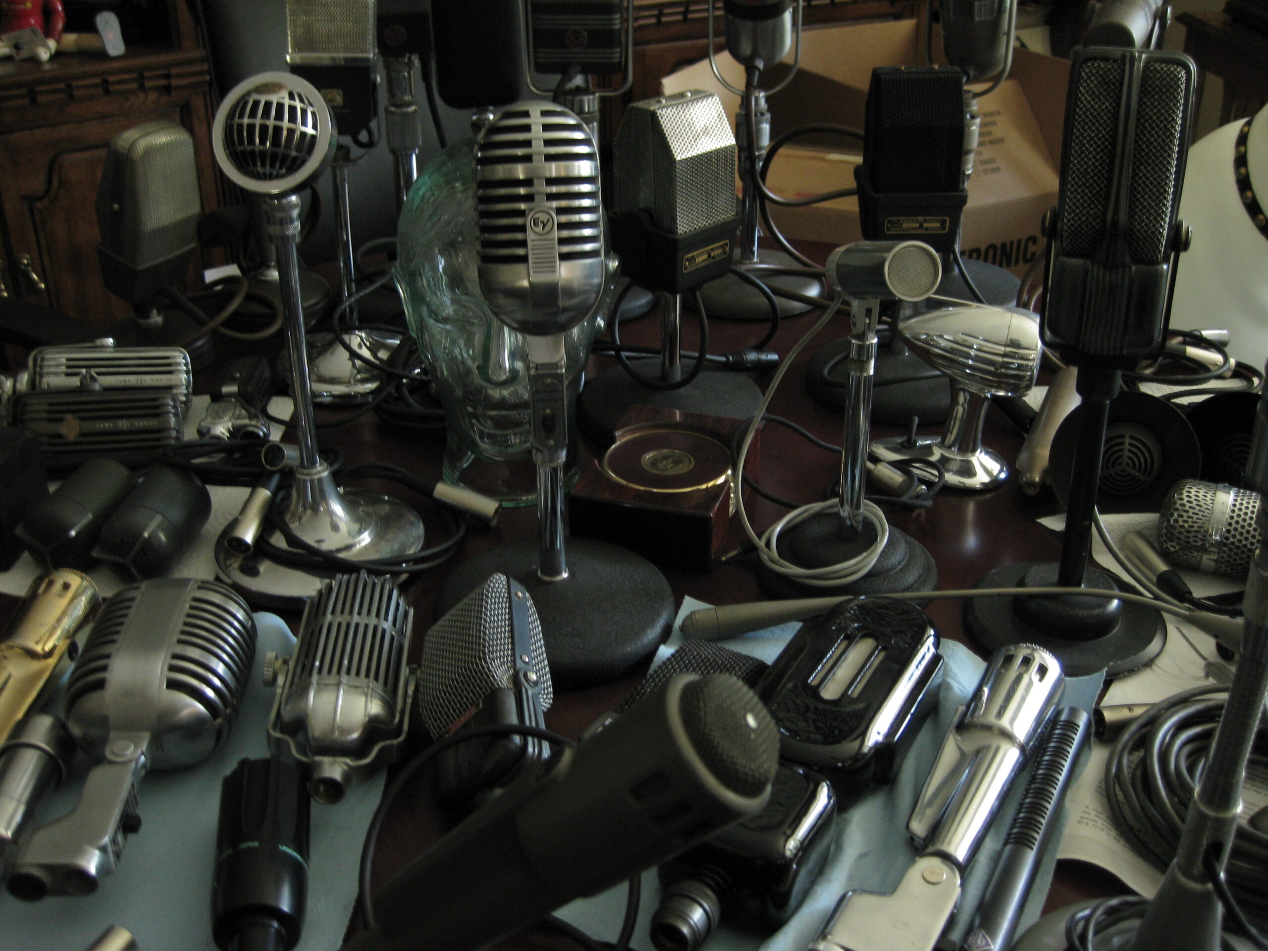 An array of vintage microphones